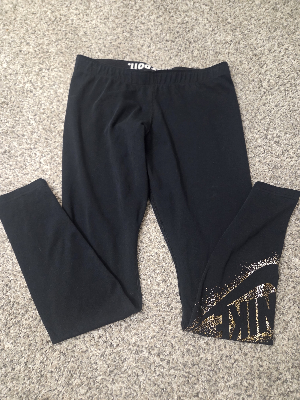Nike Black Leggings with Gold Sparkle Swoosh